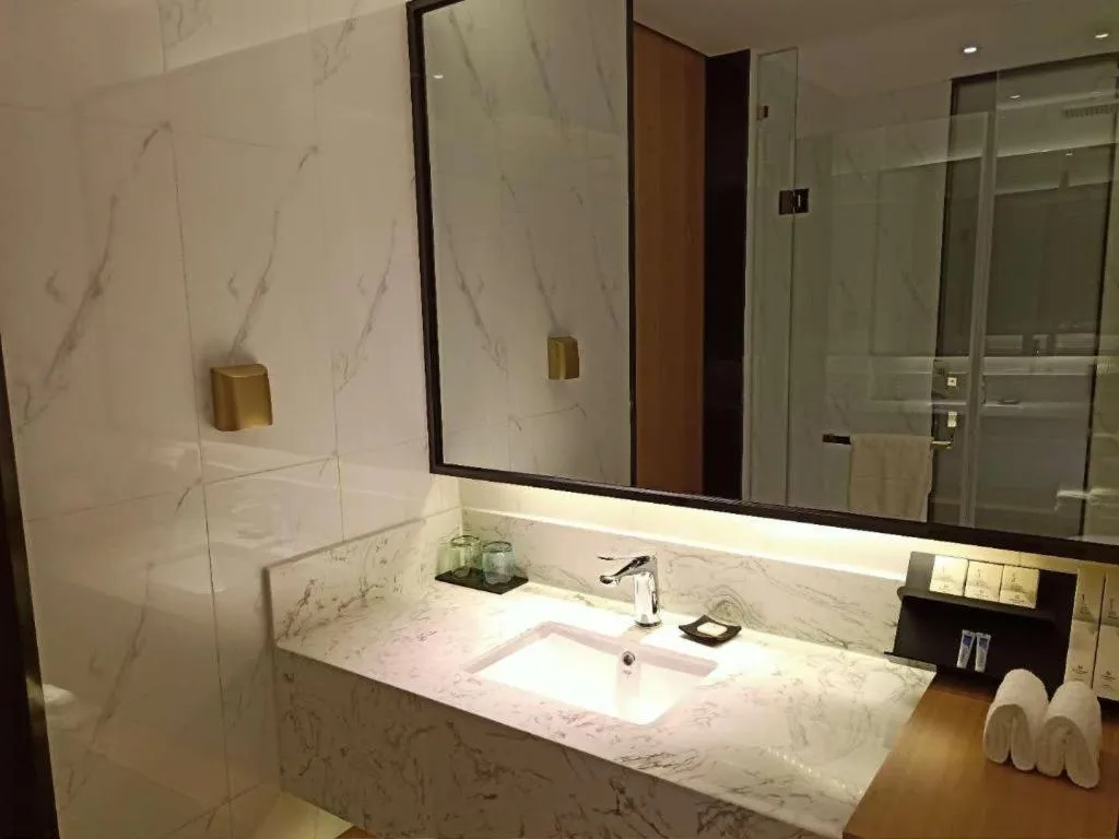 Bed in Borrman Hotel Jining Rencheng District Government Zhongde Plaza