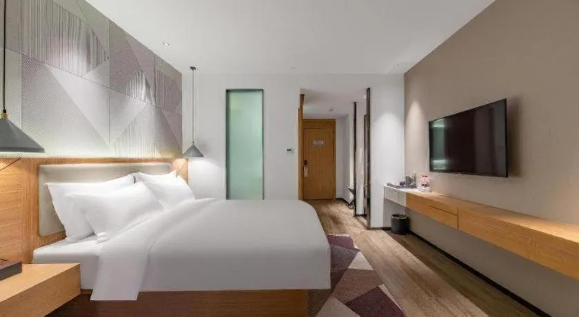 Bed in Borrman Hotel Jining Rencheng District Government Zhongde Plaza