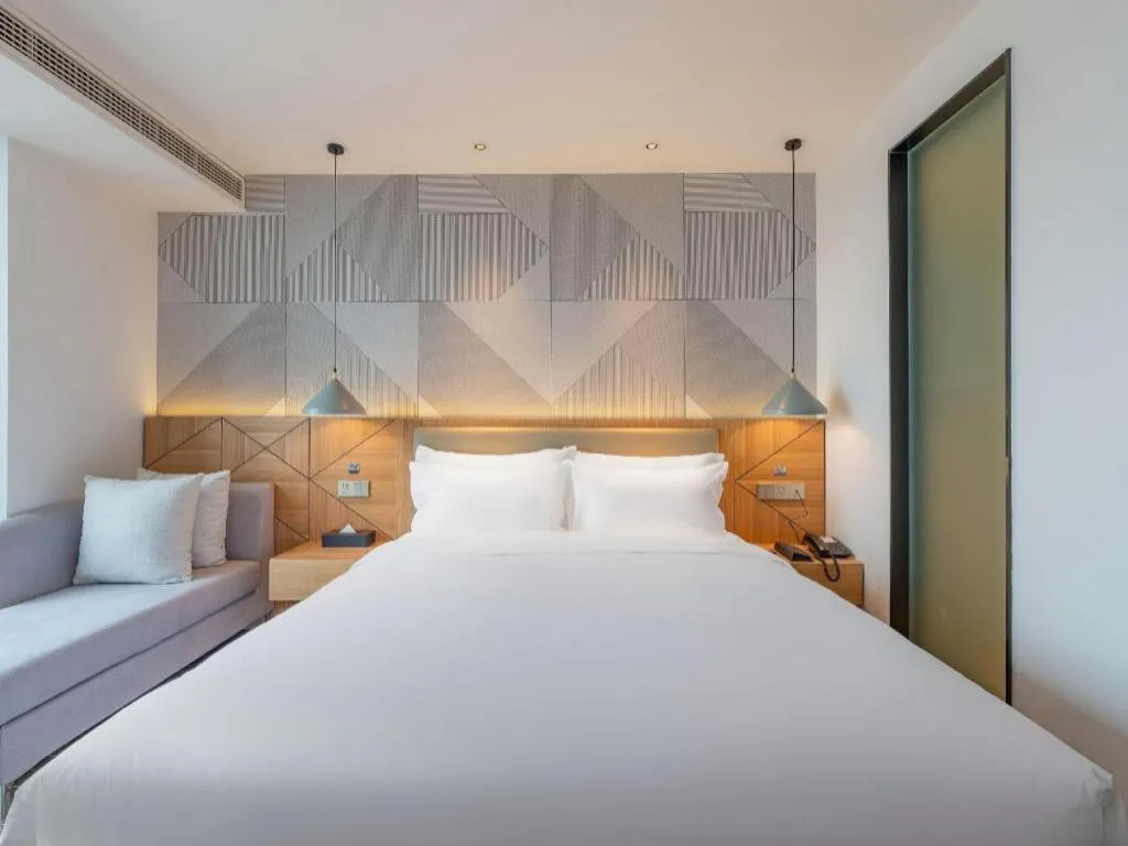 Bed in Borrman Hotel Jining Rencheng District Government Zhongde Plaza