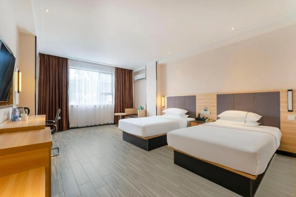 Bed in City Comfort Inn Yangjiang Yangxi Renmin Road Triumph Plaza