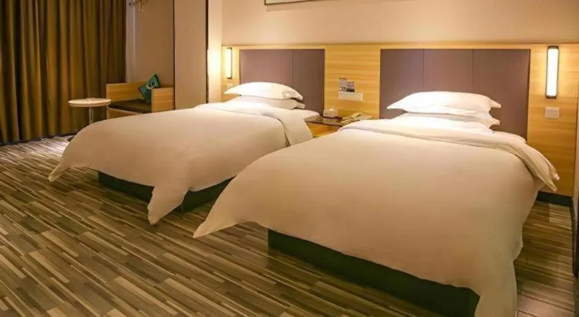 Bed in City Comfort Inn Yangjiang Yangxi Renmin Road Triumph Plaza