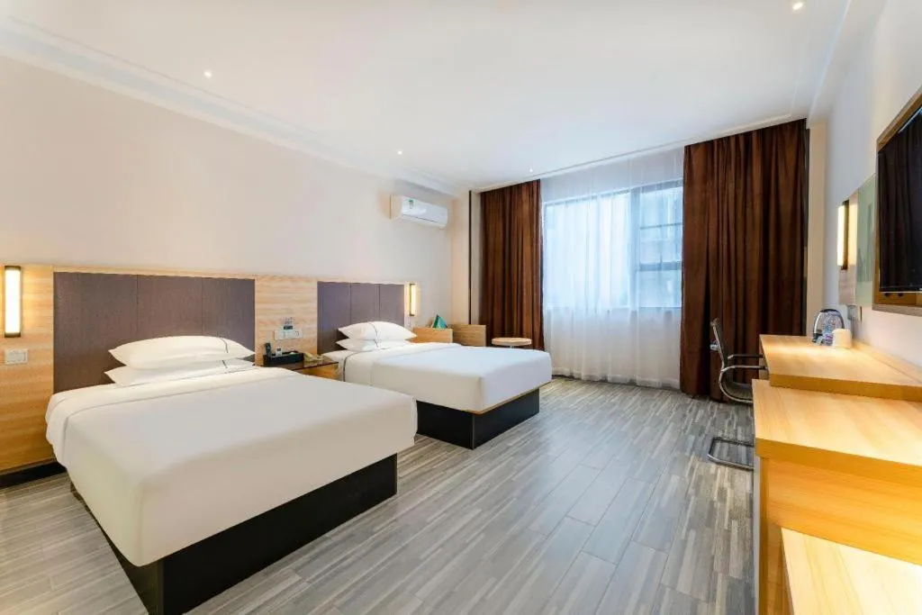 Bed in City Comfort Inn Yangjiang Yangxi Renmin Road Triumph Plaza