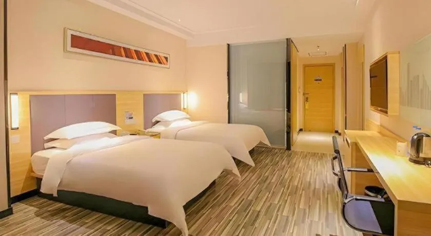Bed in City Comfort Inn Yangjiang Yangxi Renmin Road Triumph Plaza