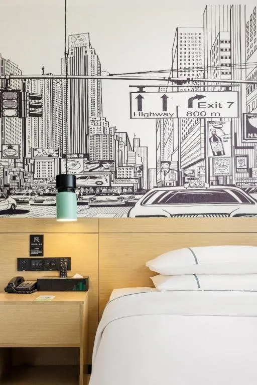 Bed in City Comfort Inn Shiyan High-speed Railway Wanda Plaza