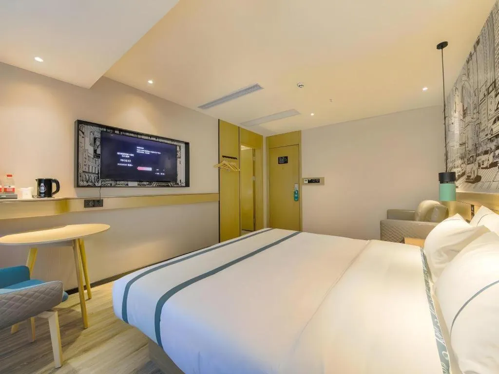 Bed in City Comfort Inn Shiyan High-speed Railway Wanda Plaza