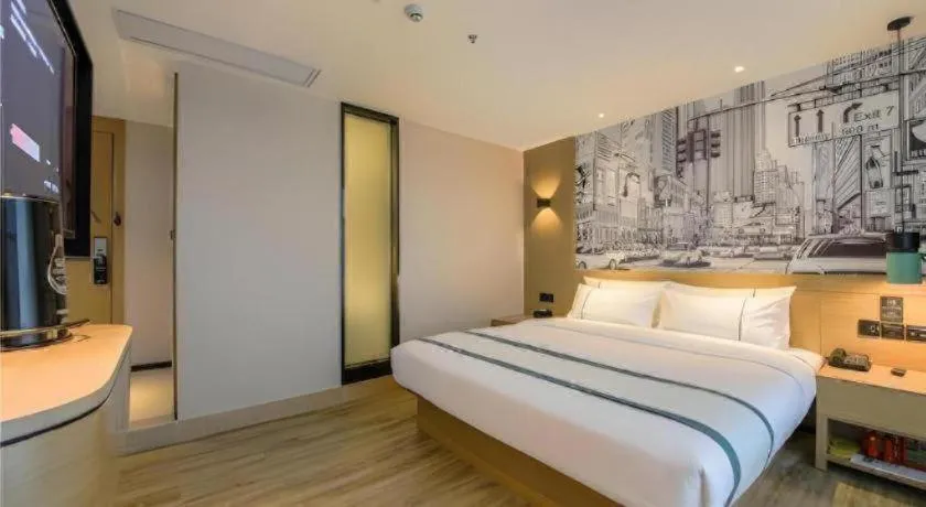 Bed in City Comfort Inn Shiyan High-speed Railway Wanda Plaza