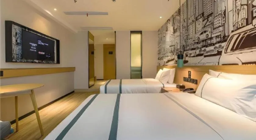 Bed in City Comfort Inn Shiyan High-speed Railway Wanda Plaza