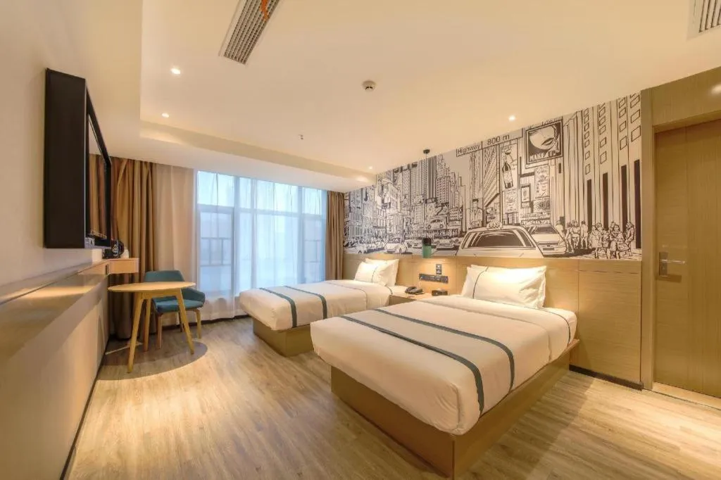 Bed in City Comfort Inn Shiyan High-speed Railway Wanda Plaza