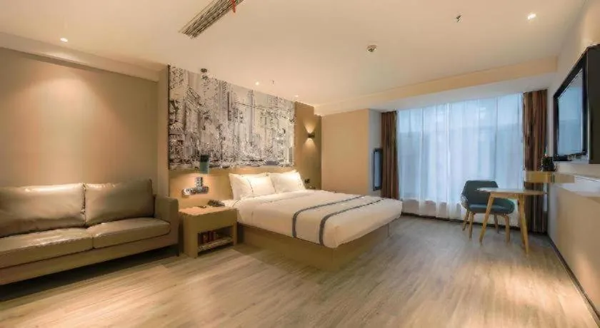 Bed in City Comfort Inn Shiyan High-speed Railway Wanda Plaza