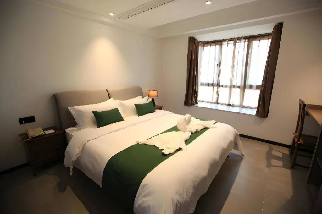 Bed in Immersing Hotels & Resort Yunzhu Meiyuan Wuyishan Impression Dahongpao