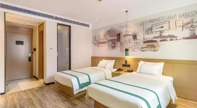 Bed in City Comfort Inn Quanzhou Wanda