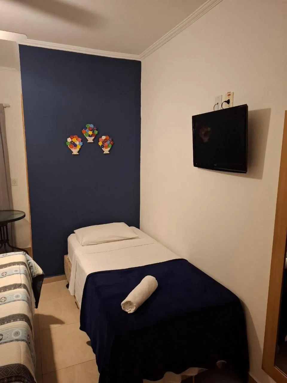 Bed in Pousada Villa Virgínia Guarujá