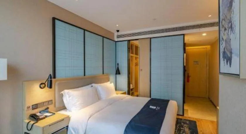 Bed in Echarm Hotel Hefei West Qilitang Metro Station