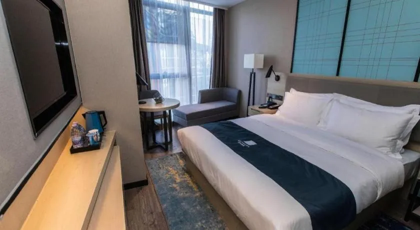 Bed in Echarm Hotel Hefei West Qilitang Metro Station