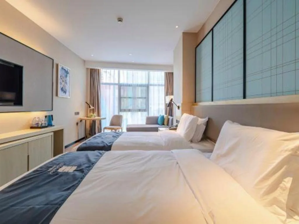 Bed in Echarm Hotel Hefei West Qilitang Metro Station