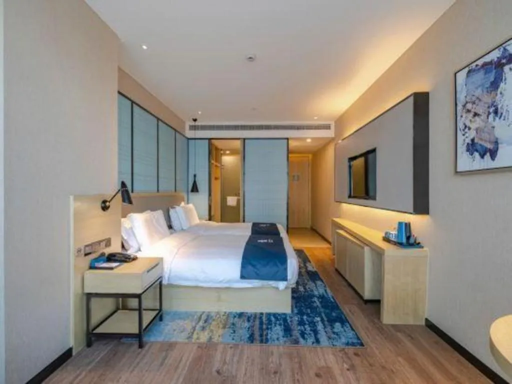 Bed in Echarm Hotel Hefei West Qilitang Metro Station