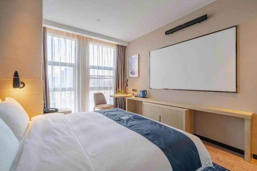 Bed in Echarm Hotel Hefei West Qilitang Metro Station