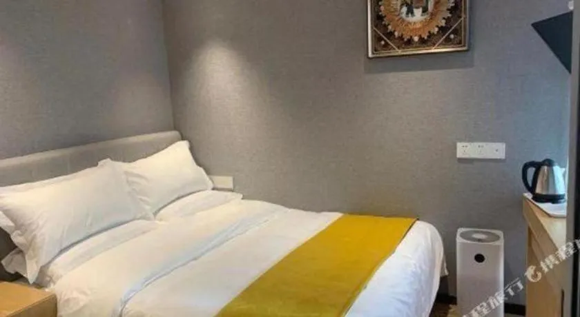 Bed in Echarm Hotel Hefei West Qilitang Metro Station