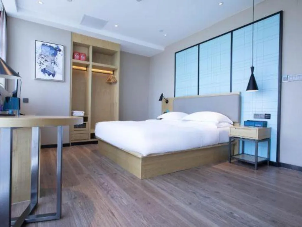Bed in Echarm Hotel Hefei West Qilitang Metro Station