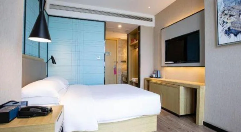 Bed in Echarm Hotel Hefei West Qilitang Metro Station