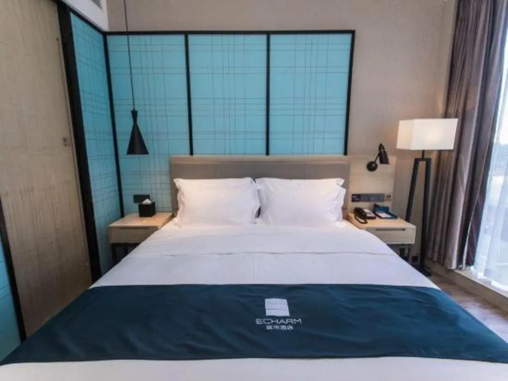 Bed in Echarm Hotel Hefei West Qilitang Metro Station
