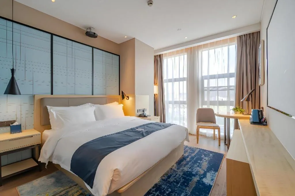 Bed in Echarm Hotel Hefei West Qilitang Metro Station