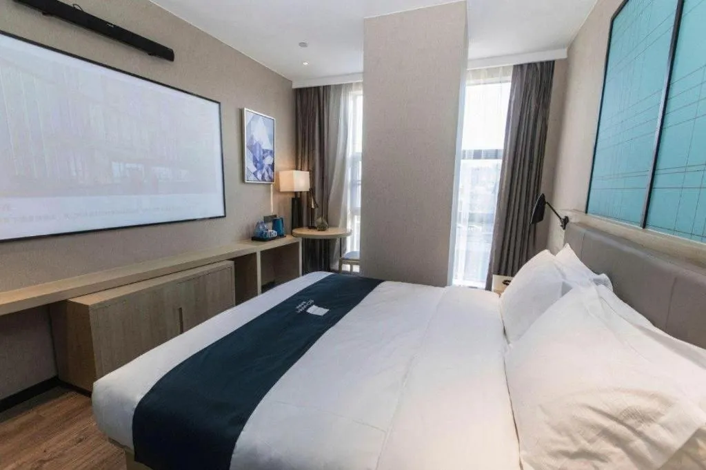 Bed in Echarm Hotel Hefei West Qilitang Metro Station