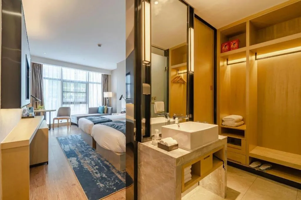 Bed in Echarm Hotel Hefei West Qilitang Metro Station