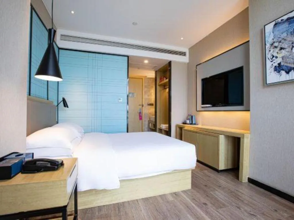 Bed in Echarm Hotel Hefei West Qilitang Metro Station