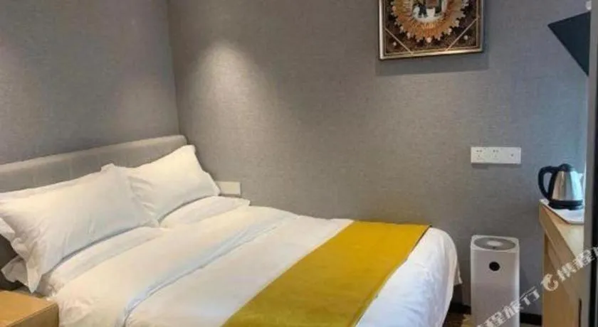 Bed in Echarm Hotel Hefei West Qilitang Metro Station