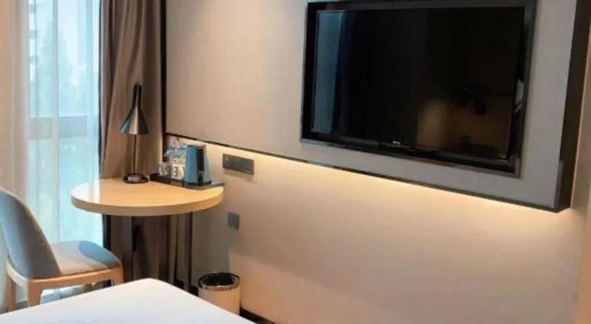 Bed in Echarm Hotel Hefei West Qilitang Metro Station