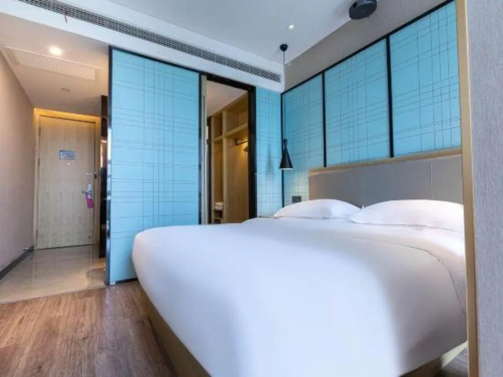 Bed in Echarm Hotel Hefei West Qilitang Metro Station