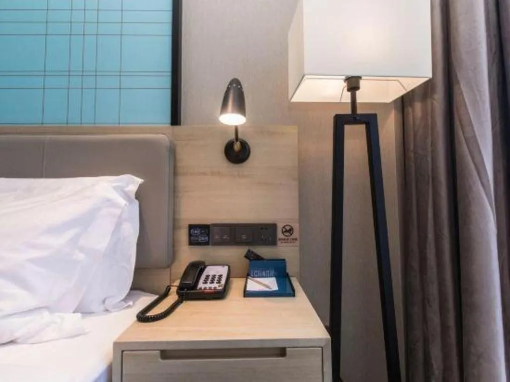 Bed in Echarm Hotel Hefei West Qilitang Metro Station