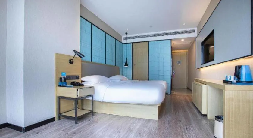 Bed in Echarm Hotel Hefei West Qilitang Metro Station