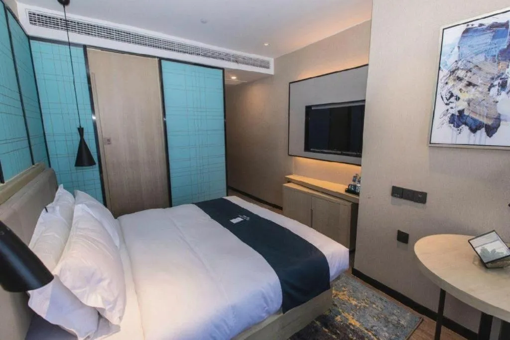 Bed in Echarm Hotel Hefei West Qilitang Metro Station