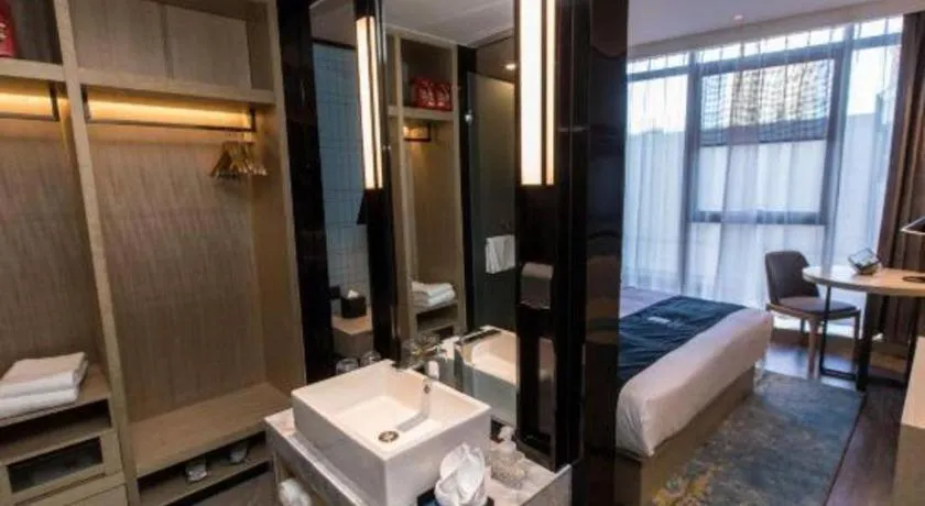 Bed in Echarm Hotel Hefei West Qilitang Metro Station