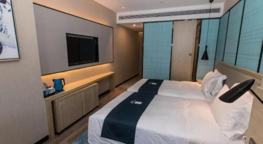 Bed in Echarm Hotel Hefei West Qilitang Metro Station