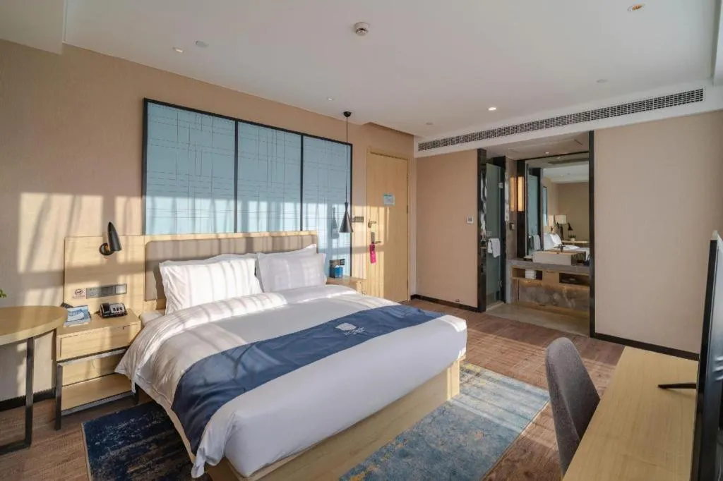 Bed in Echarm Hotel Hefei West Qilitang Metro Station