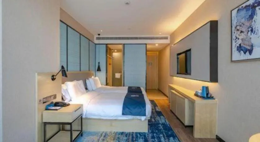 Bed in Echarm Hotel Hefei West Qilitang Metro Station
