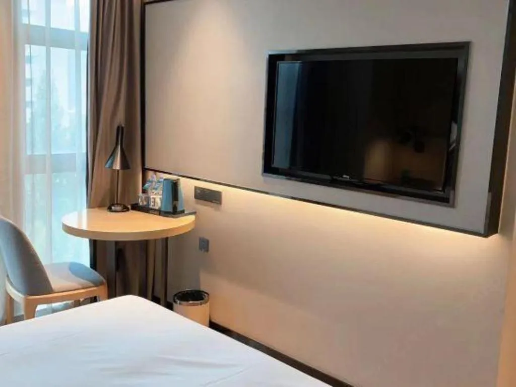 Bed in Echarm Hotel Hefei West Qilitang Metro Station