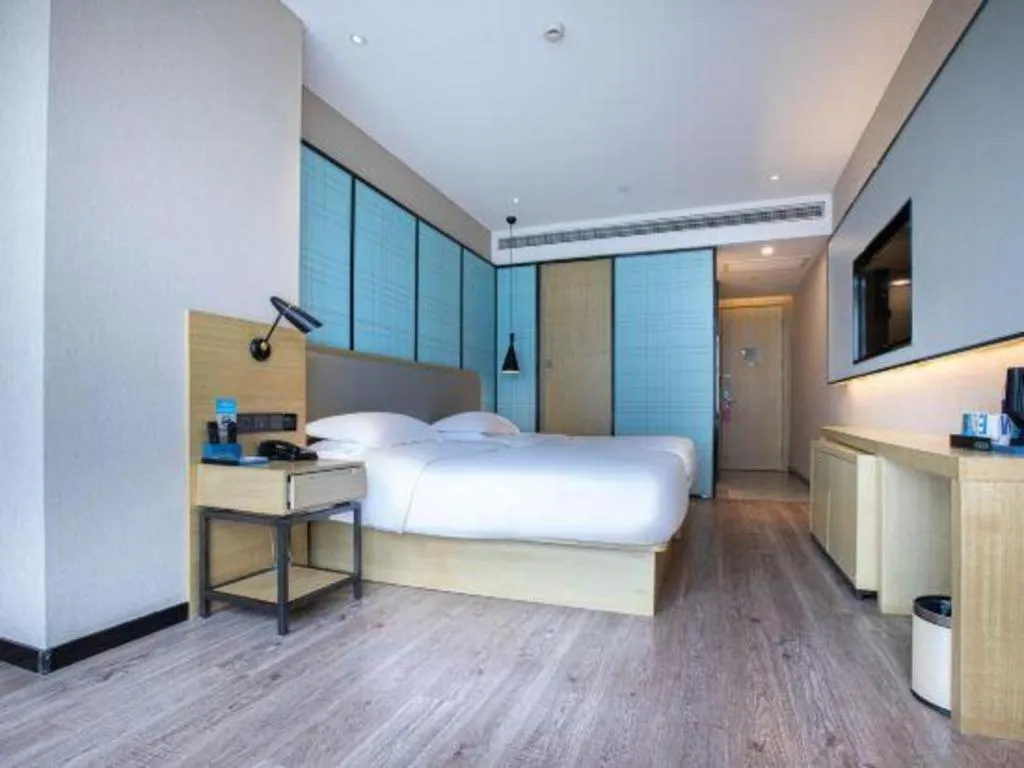 Bed in Echarm Hotel Hefei West Qilitang Metro Station