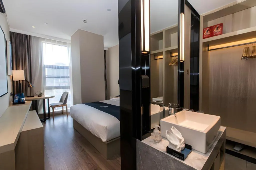 Bed in Echarm Hotel Hefei West Qilitang Metro Station