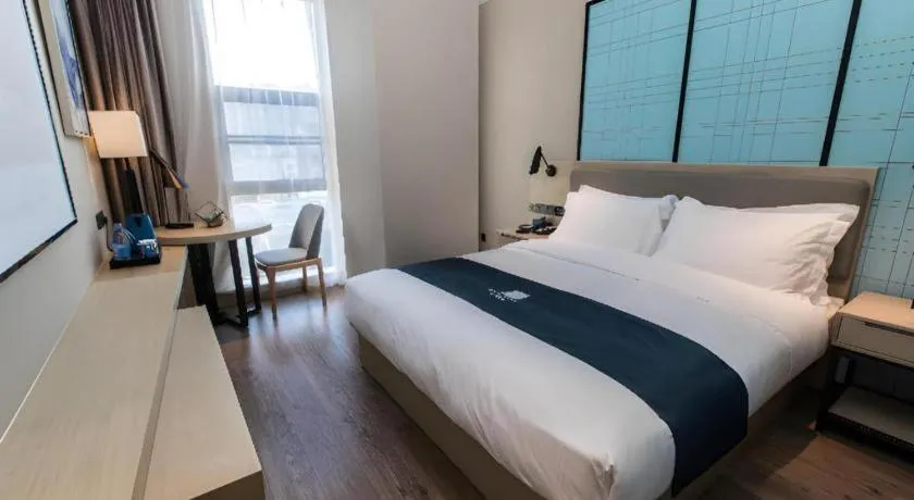 Bed in Echarm Hotel Hefei West Qilitang Metro Station