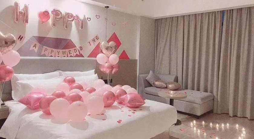 Bed in Borrman Hotel Zhongshan Henglan Xiyong