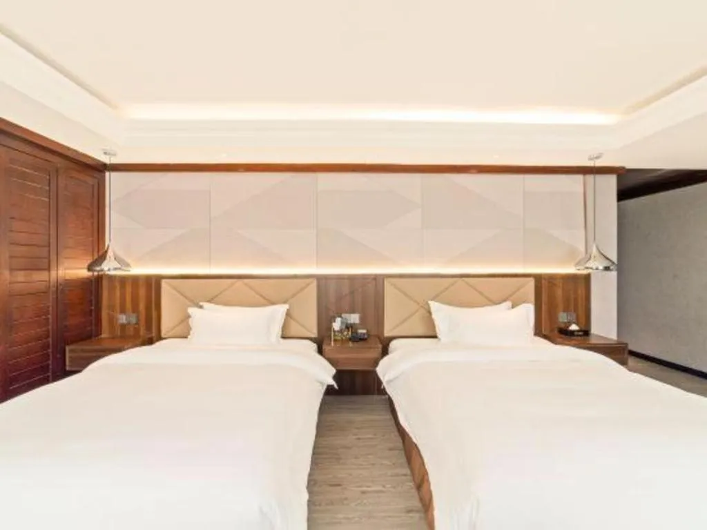 Bed in Borrman Hotel Zhongshan Henglan Xiyong