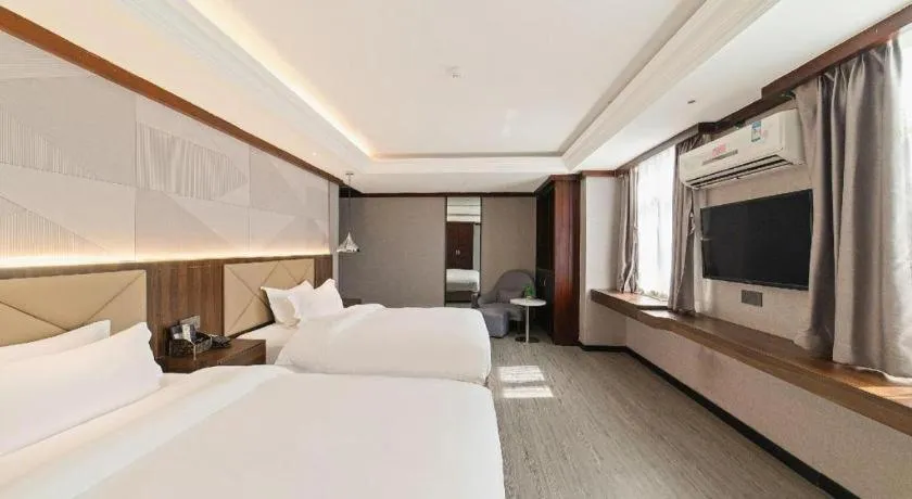 Bed in Borrman Hotel Zhongshan Henglan Xiyong