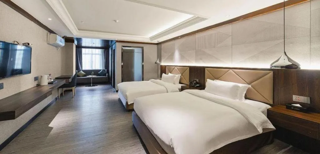 Bed in Borrman Hotel Zhongshan Henglan Xiyong