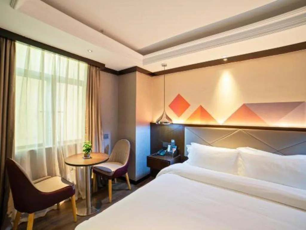 Bed in Borrman Hotel Zhongshan Henglan Xiyong