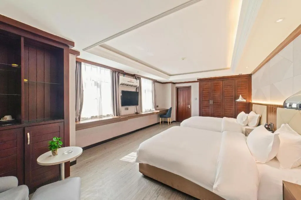 Bed in Borrman Hotel Zhongshan Henglan Xiyong