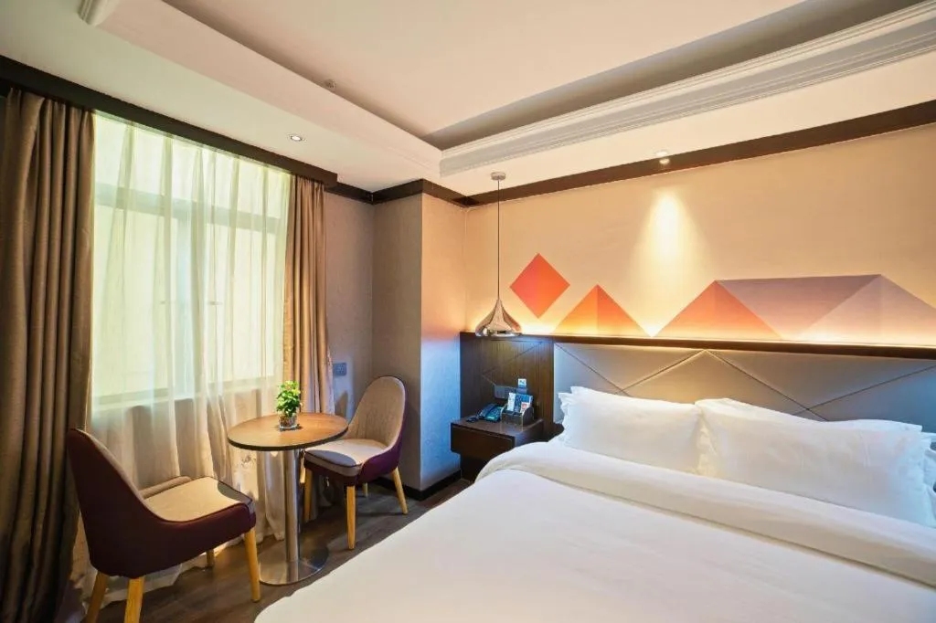 Bed in Borrman Hotel Zhongshan Henglan Xiyong